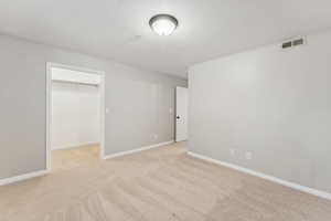 Large Primary Suite with a walk-in closet, attached full bath, new carpet and paint!