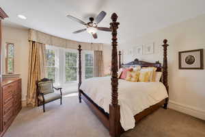 second primary bedroom with walk in closet and onsuit bath.