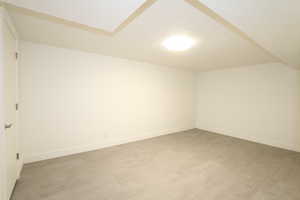 Interior space featuring hardwood / wood-style flooring and a textured ceiling