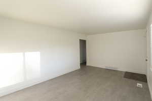 Spare room featuring light hardwood / wood-style flooring