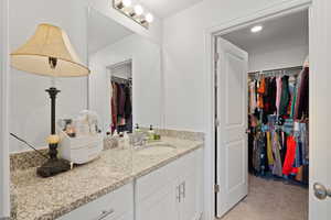 Primary en-suite with large walk-in closet