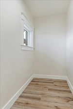 Unfurnished room featuring hardwood / wood-style floors