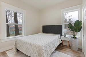 Bedroom featuring light wood-type flooring