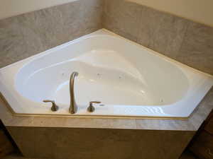 Bathroom with tiled tub