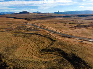 Birds eye view of property with a mountain view