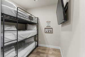 Bedroom featuring hardwood / wood-style flooring