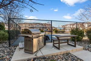 View of patio featuring grilling area