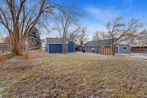 View of yard featuring a storage shed