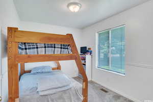 View of carpeted bedroom