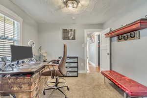 Office space with a textured ceiling