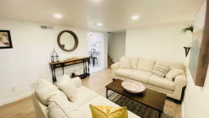 Living room featuring light wood-type flooring