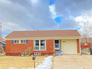 Single story home with a garage