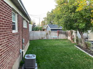 View of yard featuring central AC