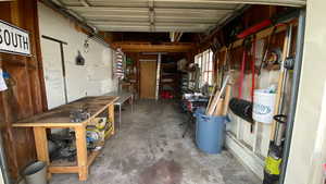 Garage featuring a workshop area