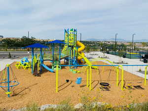 View of playground with a mountain view