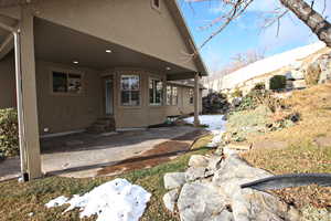 Rear view of house with a patio