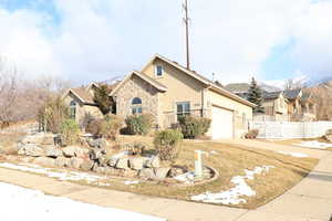 View of front property with a garage