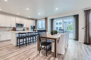 Dining space with a wealth of natural light.