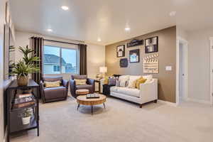 Living room featuring light colored carpet