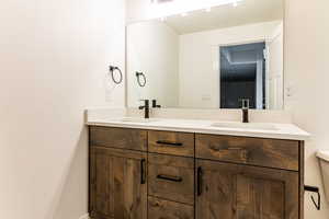 Bathroom with vanity and toilet