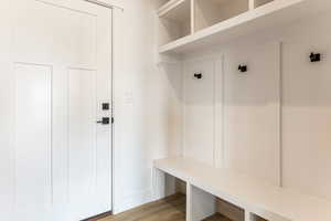 Mudroom with light hardwood / wood-style flooring