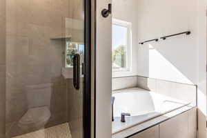 Bathroom with separate shower and tub and toilet