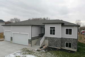 View of front facade with a garage