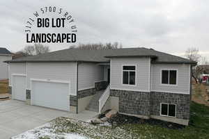 View of front of house with a garage