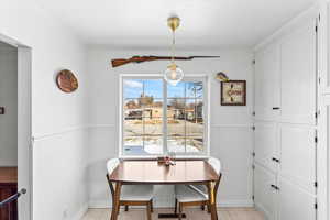 Dining area featuring light tile patterned floors