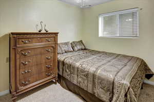 View of carpeted bedroom