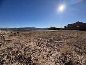 View of yard featuring a mountain view and a rural view