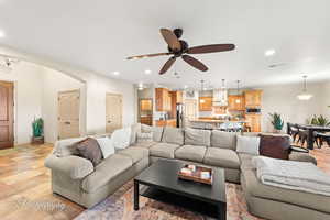 Living room featuring ceiling fan