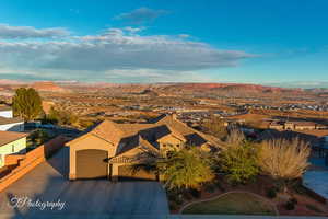 Birds eye view of property with a mountain view