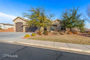 View of front of property with a garage