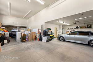 Garage featuring a garage door opener