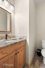 Bathroom with vanity and toilet