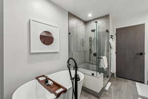 Bathroom with shower with separate bathtub