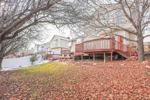 Rear view of house with a deck