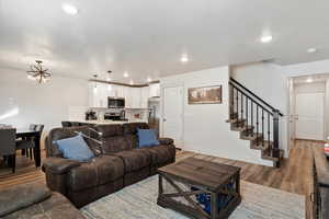 Living room, kitchen and entry way hallway