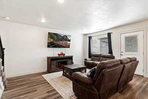 Living room with natural light and doggy door to patio