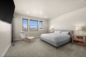 Carpeted bedroom featuring recessed lighting and baseboards
