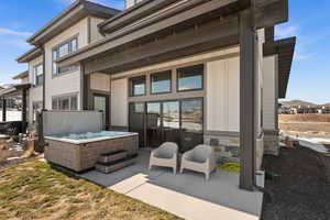 Exterior space featuring a hot tub