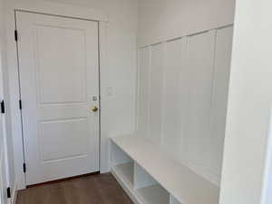 Mudroom with dark hardwood / wood-style flooring