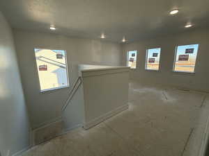 Corridor with a textured ceiling