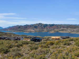 View of mountain feature with a water view