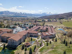 Birds eye view of property with a mountain view