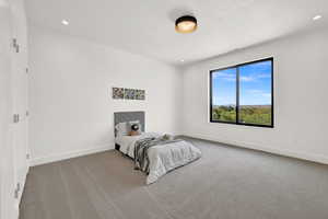 Bedroom featuring carpet flooring