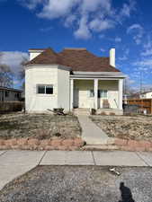 View of front of property with covered porch