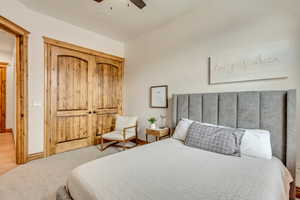 Bedroom with carpet floors and ceiling fan