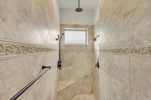 Bathroom with a tile shower